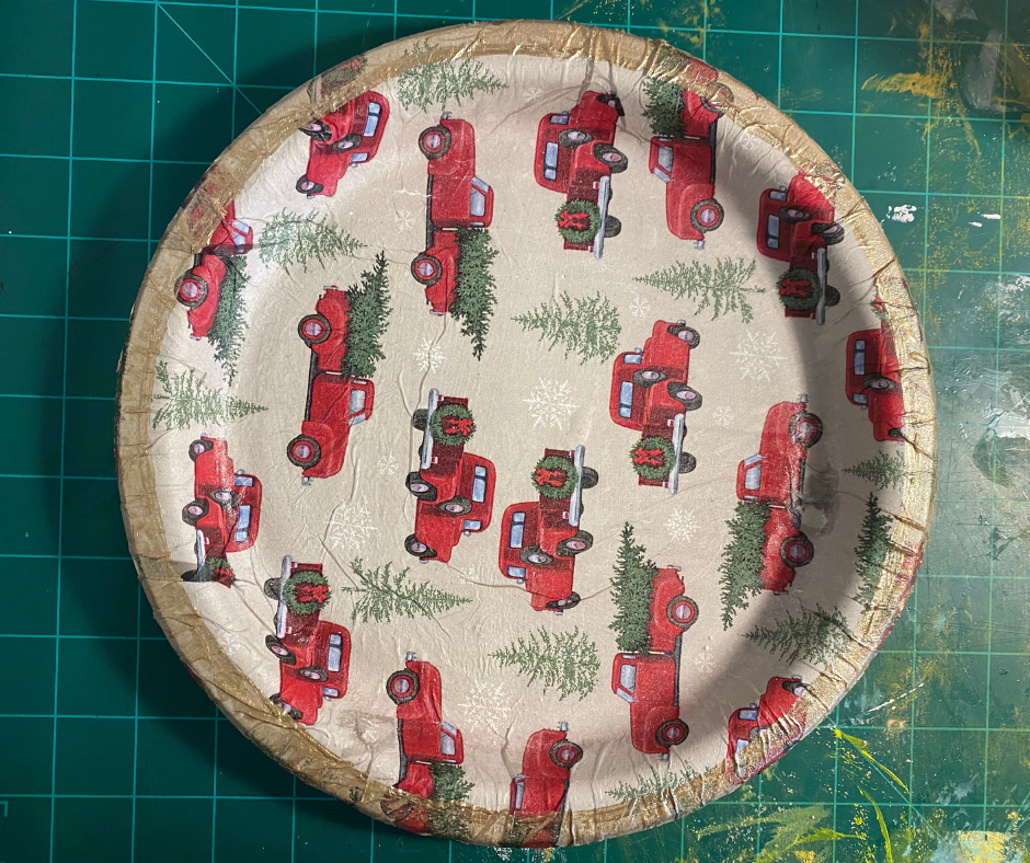 decorative Christmas plate on green table
